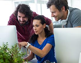 Three students at desk